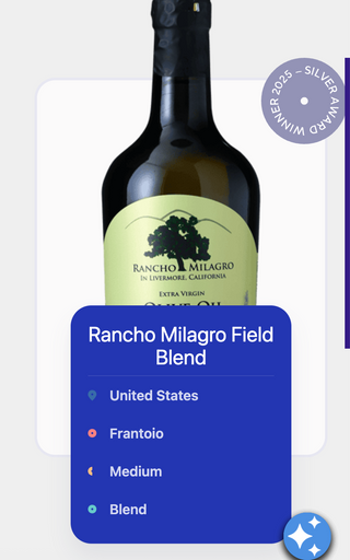 Bottle of Rancho Milagro Field Blend wine with a Silver Award badge in upper right corner, and a blue information card listing United States, Frantoio, Medium, Blend.