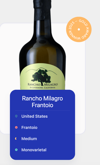 Bottle with Rancho Milagro label on a white background. Gold award badge on upper right. Frantoio identified in list: United States, Frantoio, Medium, Monovarietal